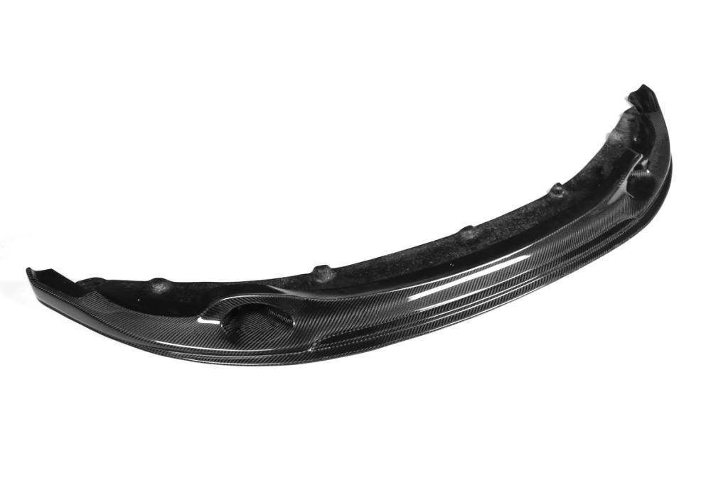 Glossy UV-protectant E82 1M carbon fiber front bumper lip side view