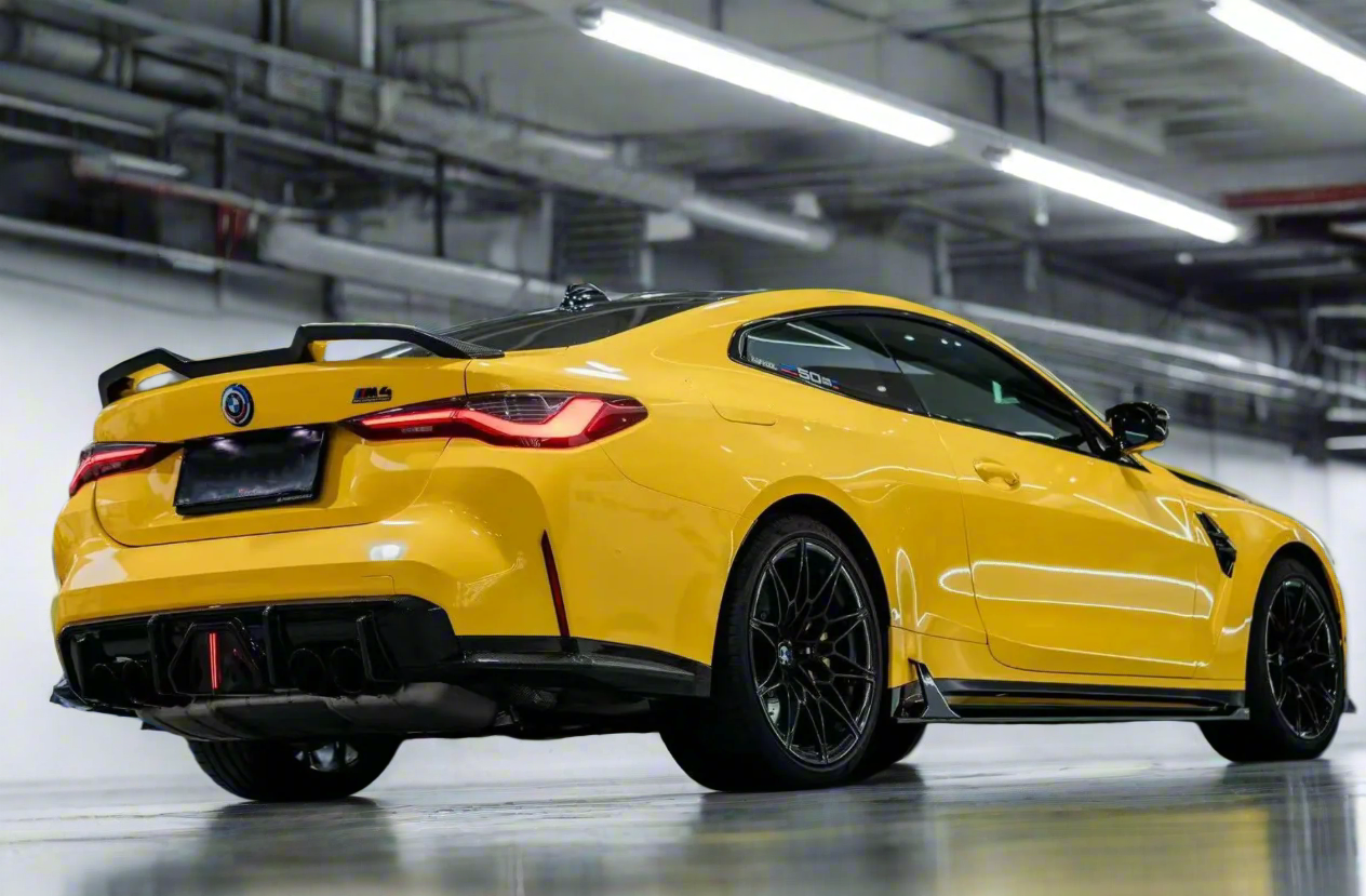 Close-up of BMW G80 M3 rear spoiler – high-gloss finish