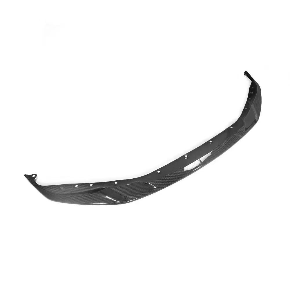 Close-up of BMW G80 M3 carbon fiber front bumper lip