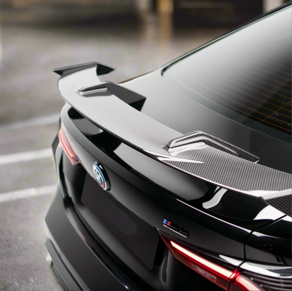 Close-up of BMW G80 M3 carbon fiber M Performance style rear wing