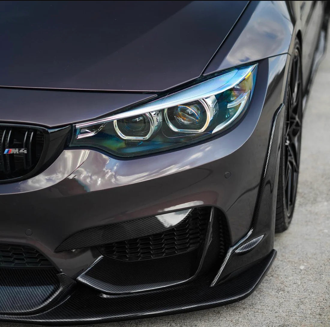 Close-up of BMW F80 M3 front lip carbon fiber aggressive styling