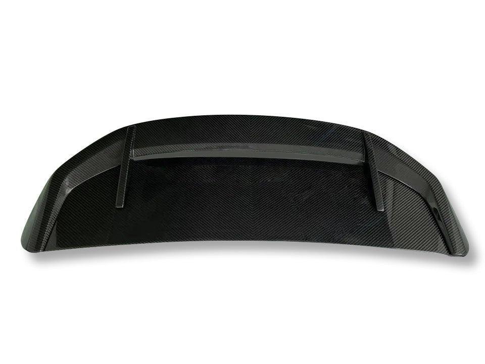 BMW X3M rear spoiler showing carbon fiber texture
