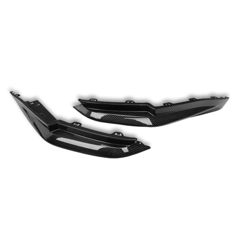 Close-up of BMW M4 G82 carbon fiber front bumper and grille