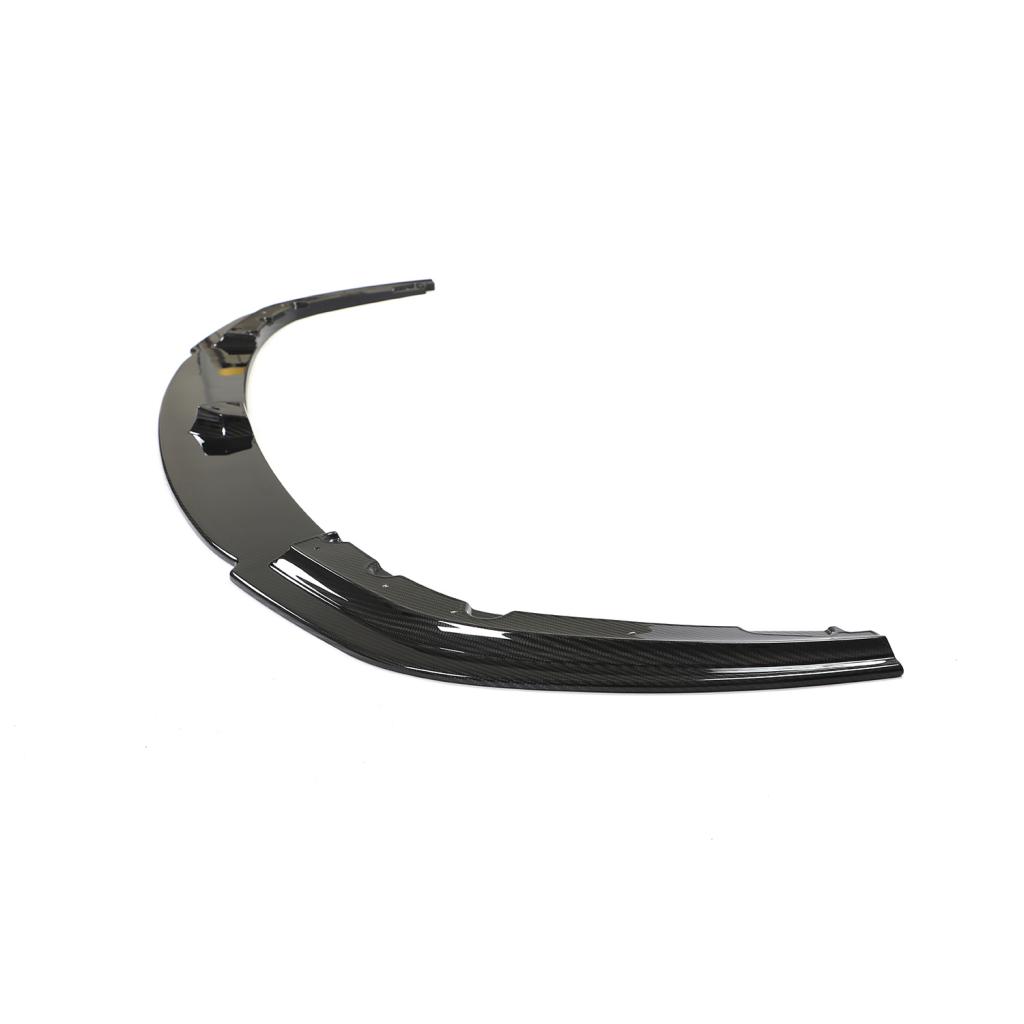 Side angle BMW F92 M8 front splitter showing aggressive aerodynamic design