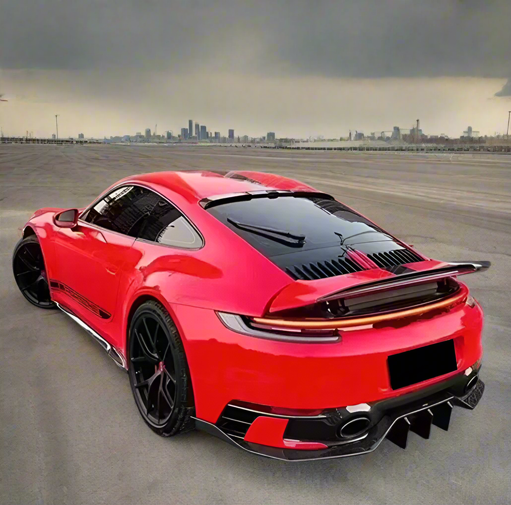 Porsche 911 992 Carrera Carbon Fiber Body Kit - Front Lip, Side Skirts, Rear Diffuser, and Spoiler